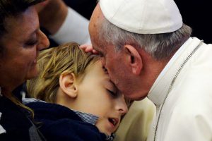 Pope-Francis-kisses-sick-child